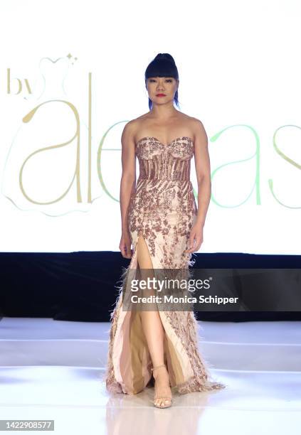 Model walks the runway for By Alexas during The Fashion Life Tour presents New York Fashion Week hosted by Kiara Belen on September 10, 2022 in New...