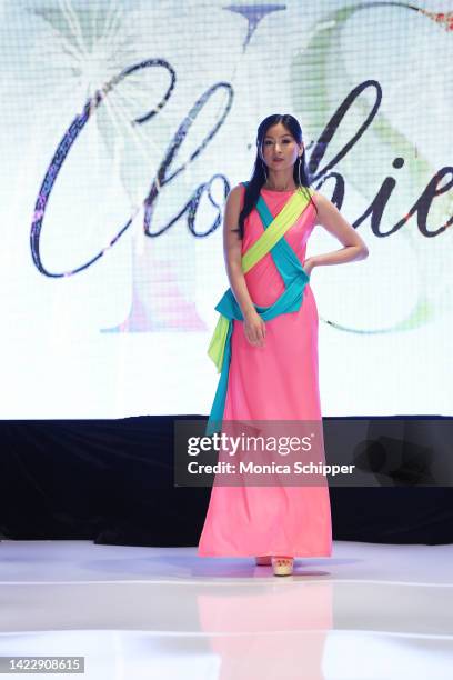 Model walks the runway for YS Clothier during The Fashion Life Tour presents New York Fashion Week hosted by Kiara Belen on September 10, 2022 in New...