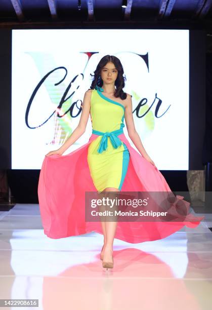 Model walks the runway for YS Clothier during The Fashion Life Tour presents New York Fashion Week hosted by Kiara Belen on September 10, 2022 in New...