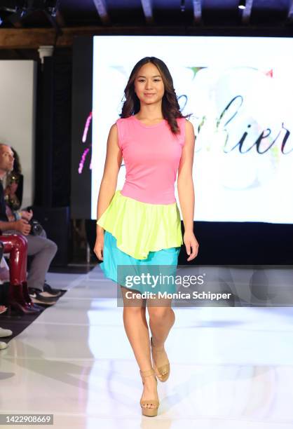 Model walks the runway for YS Clothier during The Fashion Life Tour presents New York Fashion Week hosted by Kiara Belen on September 10, 2022 in New...