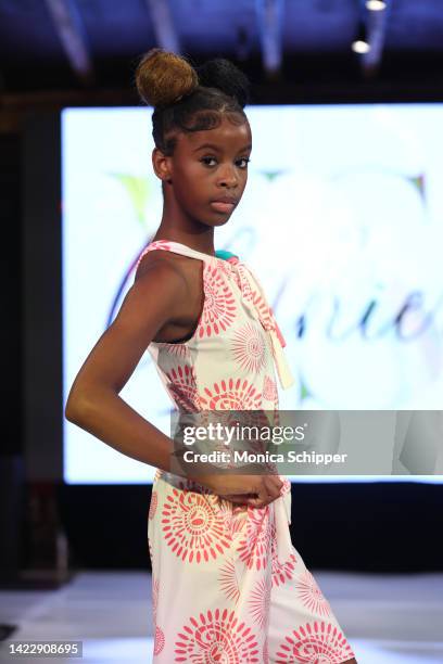 Model walks the runway for YS Clothier during The Fashion Life Tour presents New York Fashion Week hosted by Kiara Belen on September 10, 2022 in New...