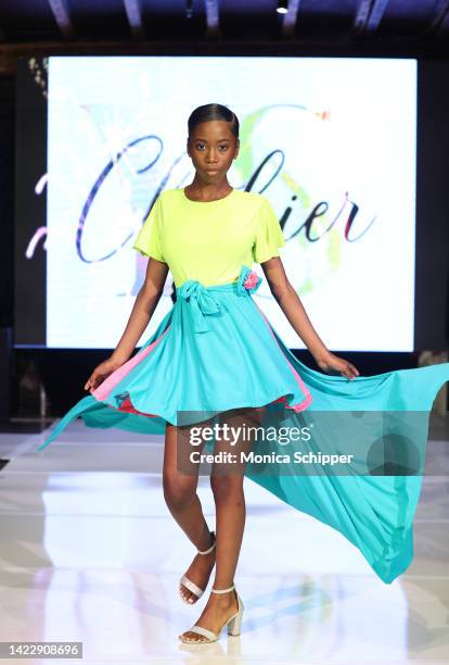 Model walks the runway for YS Clothier during The Fashion Life Tour presents New York Fashion Week hosted by Kiara Belen on September 10, 2022 in New...