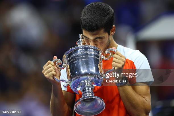 Carlos Alcaraz of Spain celebrates with the championship trophy after defeating Casper Ruud of Norway during their Men’s Singles Final match on Day...