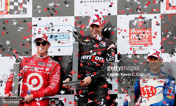 Will Power of Australia, driver of the Team Penske Chevrolet, Scott Dixon of New Zealand, driver of the Target Chip Ganassi Racing Honda, and Helio...