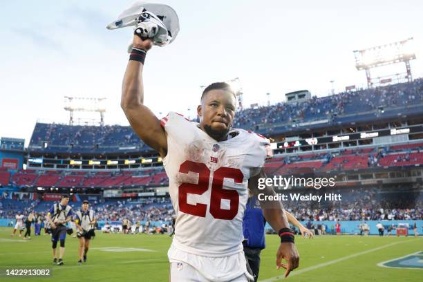 Running back Saquon Barkley of the New York Giants celebrates after his team's 21-20 victory against the Tennessee Titans at Nissan Stadium on...