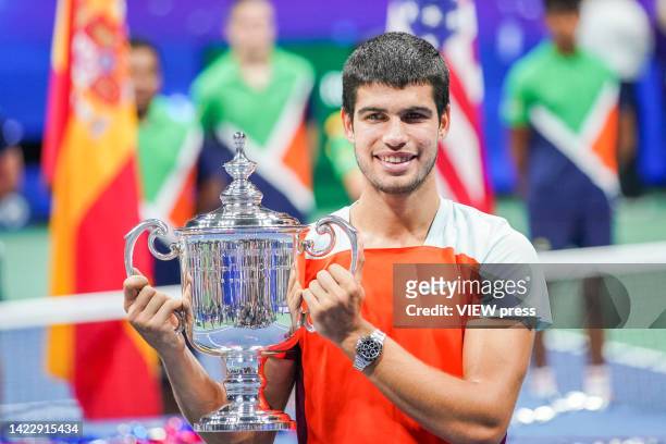 Carlos Alcaraz of Spain celebrates the championship with the thropy after defeating Casper Ruud of Norway during their Men's Singles Final match in...