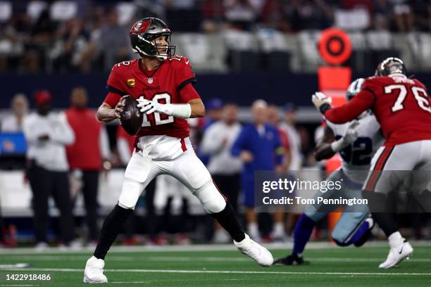Tom Brady of the Tampa Bay Buccaneers looks to pass against the Dallas Cowboys during the first half at AT&T Stadium on September 11, 2022 in...