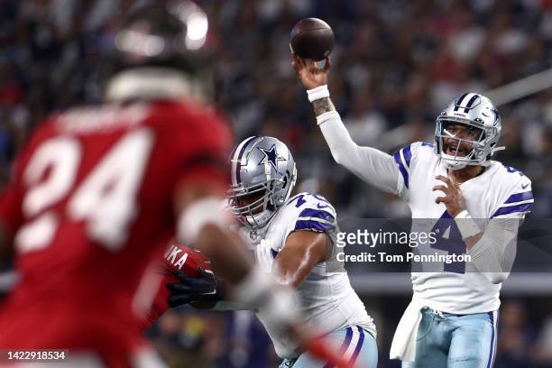 Dak Prescott of the Dallas Cowboys throws against the Tampa Bay Buccaneers during the first half at AT&T Stadium on September 11, 2022 in Arlington,...
