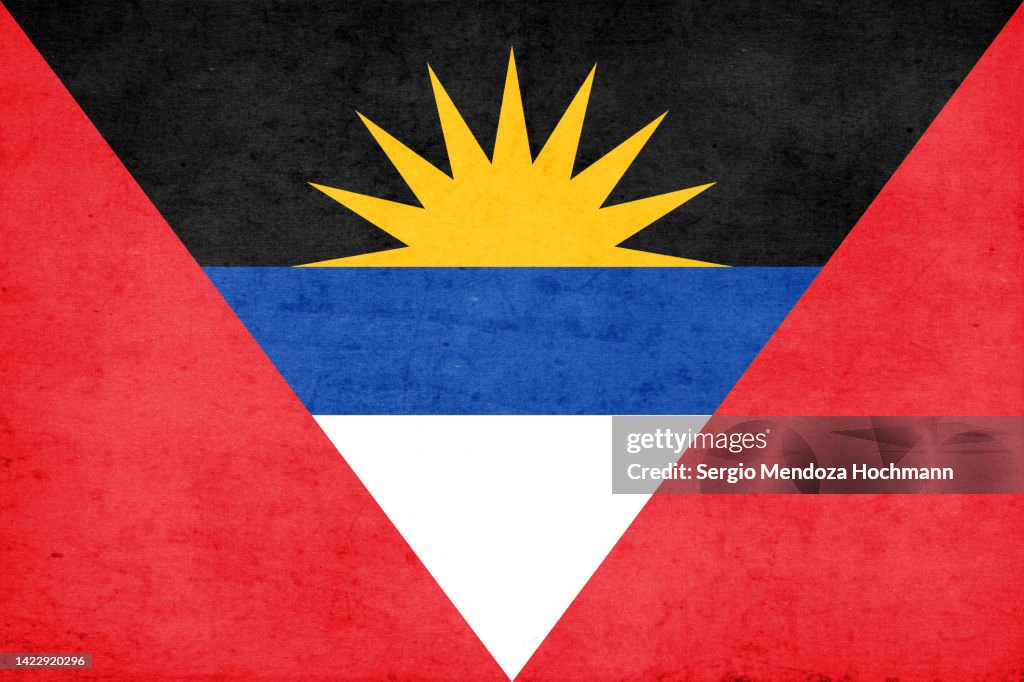 Flag of Antigua and Barbuda with a grunge texture