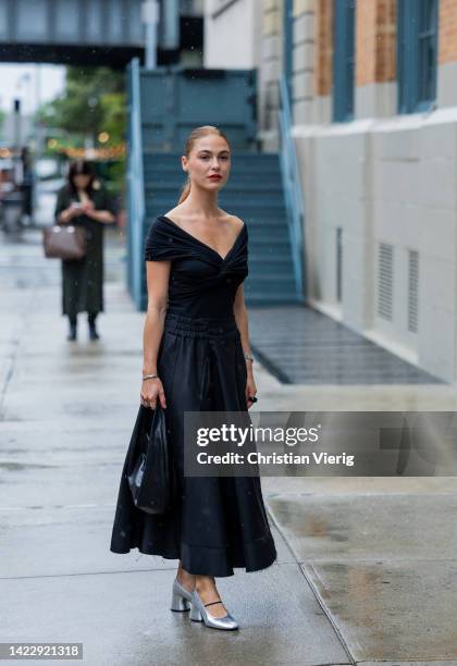 Sophia Roe wearing black dress, silver heels outside Khaite on September 11, 2022 in New York City.