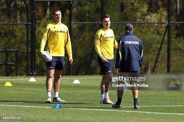 Shaun Lane and Clinton Gutherson speak to Eels coach Brad Arthur during a Parramatta Eels NRL training session at Kellyville Park on September 12,...