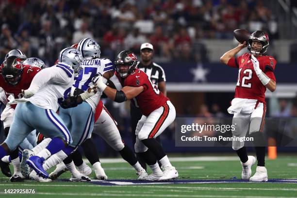 Tom Brady of the Tampa Bay Buccaneers throws against the Dallas Cowboys during the first half at AT&T Stadium on September 11, 2022 in Arlington,...