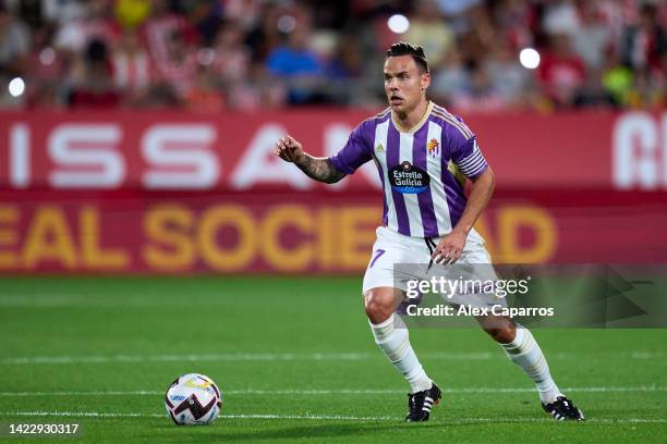 Roque Mesa of Real Valladolid CF runs with the ball during the LaLiga Santander match between Girona FC and Real Valladolid CF at Montilivi Stadium...