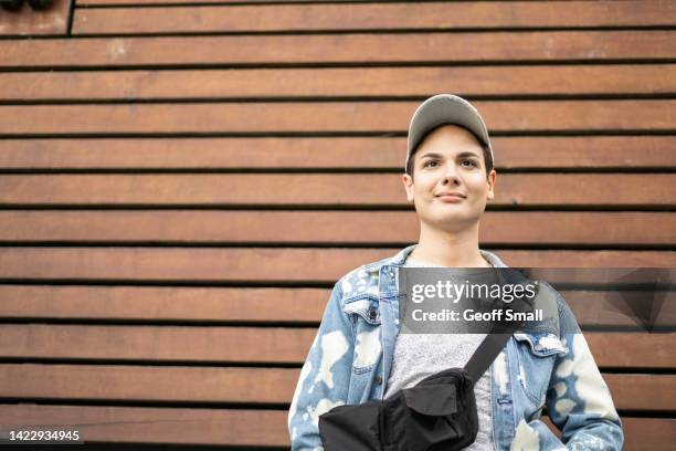 portraiti of a hopeful person - non binary stereotypes stock pictures, royalty-free photos & images