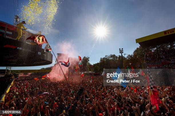 Charles Leclerc of Ferrari and Monaco celebrates with the Tifosi on finishing in 2nd position during the F1 Grand Prix of Italy at Autodromo...