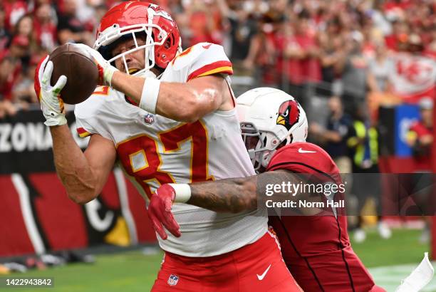 Travis Kelce of the Kansas City Chiefs catches a touchdown pass against the Arizona Cardinals at State Farm Stadium on September 11, 2022 in...