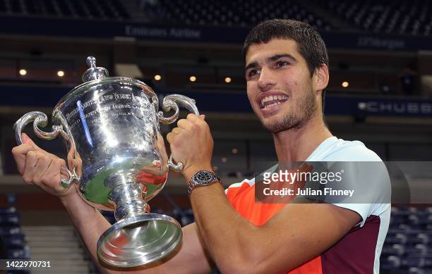 Carlos Alcaraz of Spain celebrates with the winners trophy after defeating Casper Ruud of Norway during their Men’s Singles Final match on Day...
