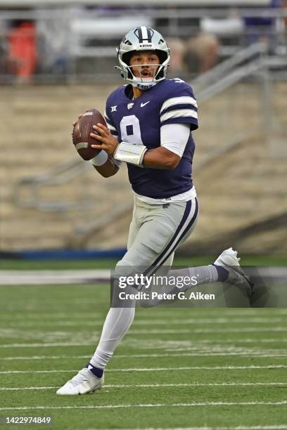 Quarterback Adrian Martinez of the Kansas State Wildcats looks down field against the Missouri Tigers during the first half at Bill Snyder Family...