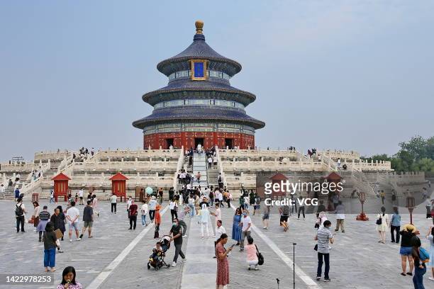 Tourists visit Tiantan Park during the Mid-Autumn Festival holiday on September 11, 2022 in Beijing, China.