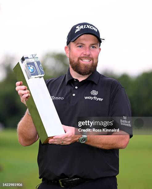 Shane Lowry of Ireland celebrates with the winners trophy on the 18th green after the final round of the BMW PGA Championship at Wentworth Golf Club...