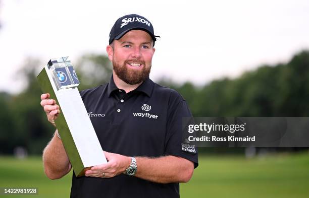 Shane Lowry of Ireland celebrates with the winners trophy on the 18th green after the final round of the BMW PGA Championship at Wentworth Golf Club...