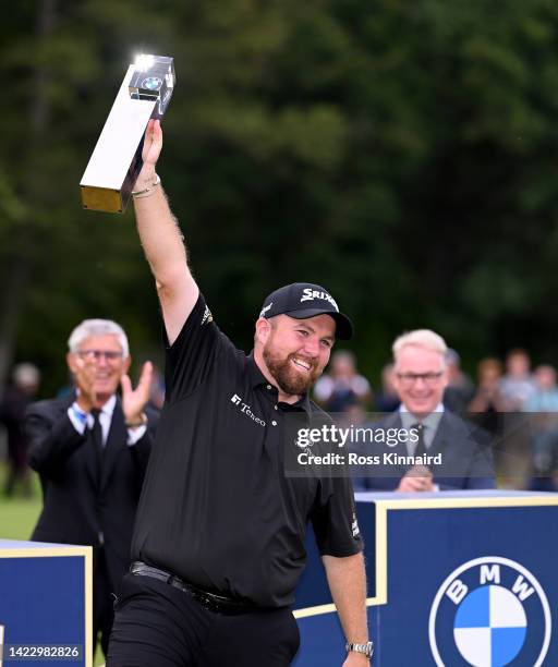 Shane Lowry of Ireland celebrates with the winners trophy on the 18th green after the final round of the BMW PGA Championship at Wentworth Golf Club...