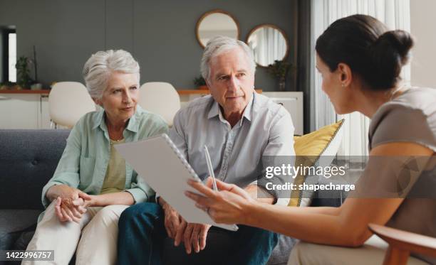 senior couple consulting with lawyer about finance, planning health insurance with advisor and retirement meeting with finance consultant. financial employee with trust documents for man and woman - chill by will 2018 stock pictures, royalty-free photos & images