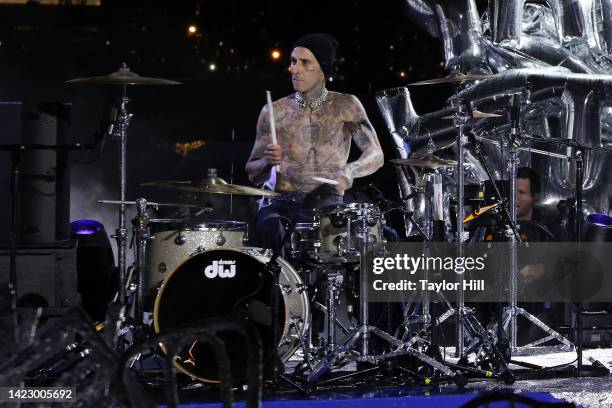 Travis Barker performs at the Tommy Factory New York Fall 2022 fashion show at Skyline Drive-In during New York Fashion Week on September 11, 2022 in...