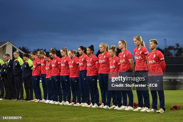 The England team observe a minutes silence in tribute to Her Majesty Queen Elizabeth II, who died at Balmoral Castle on September 8, 2022 before the...