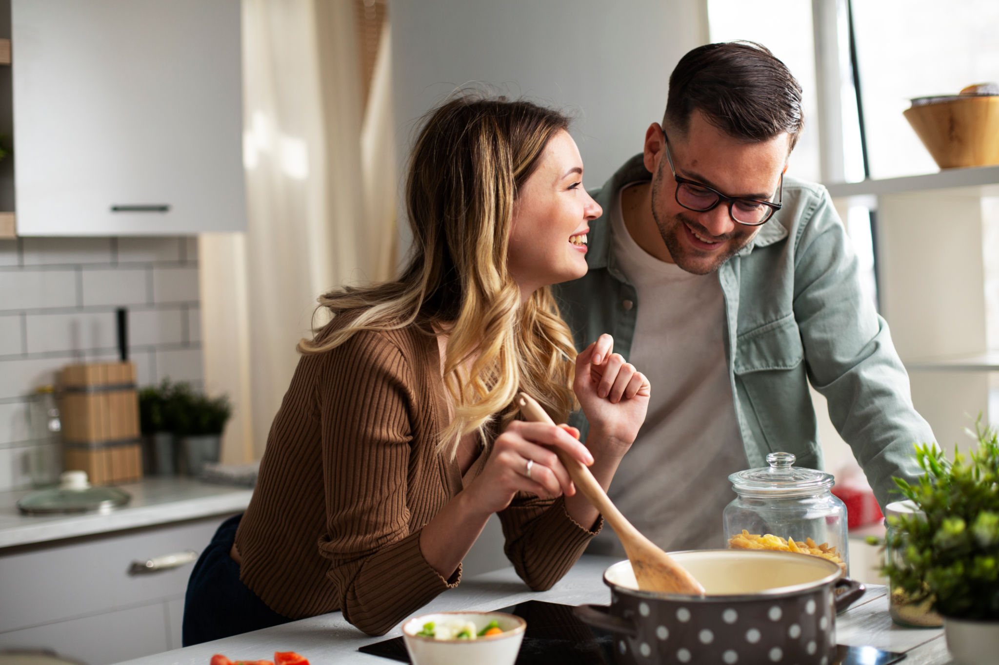 couple cooking together