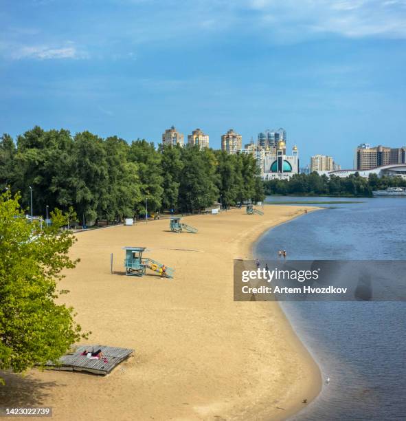 empty river beach of kyiv city. summer time season - dnieper river stock pictures, royalty-free photos & images