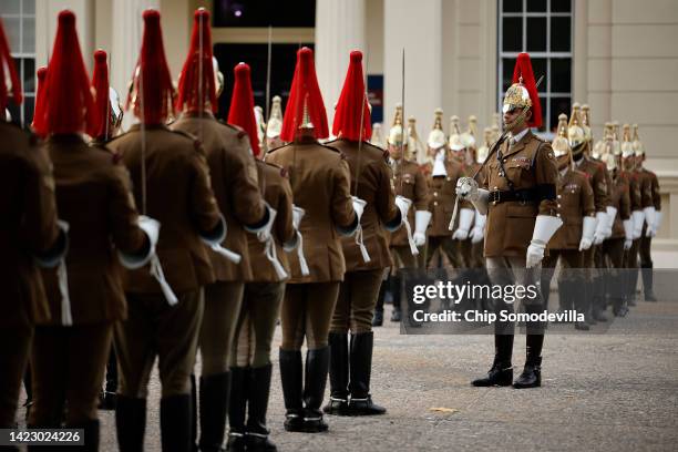 Members of the British military hold a dress rehearsal for the funeral of Queen Elizabeth II at Wellington Barracks on September 12, 2022 in London,...