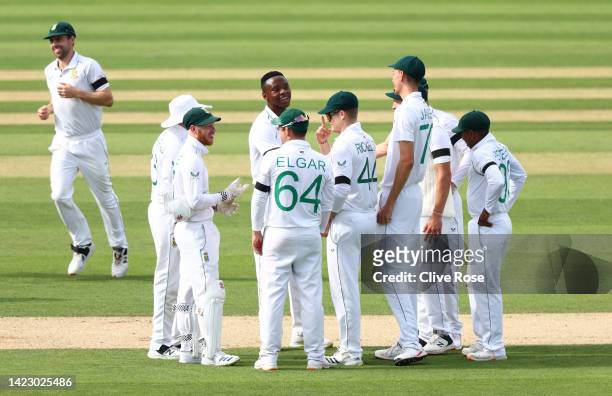 South Africa bowler Kagiso Rabada celebrates with team mates after taking the wicket of England batsman Alex Lees during day five of the Third LV=...