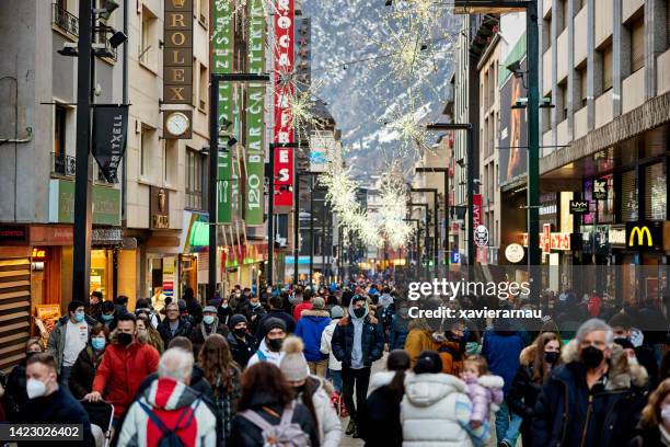 commercial street in andorra la vella at christmas - andorra la vella stockfoto's en -beelden