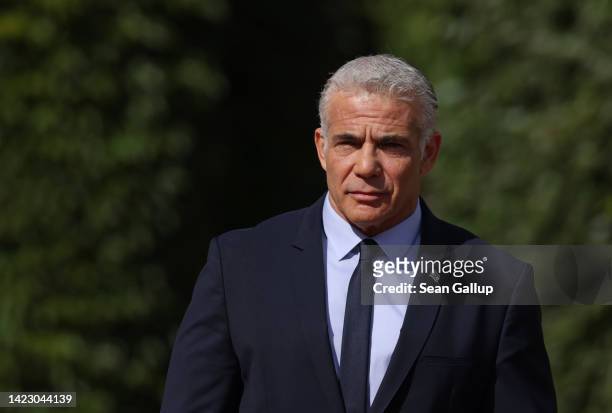 Interim Israeli Prime Minister Yair Lapid arrives to meet with German Chancellor Olaf Scholz at the Chancellery on September 12, 2022 in Berlin,...