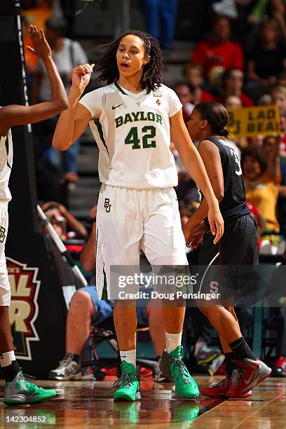 Brittney Griner of the Baylor Bears reacts in the first half against the Stanford Cardinal during the National Semifinal game of the 2012 NCAA...