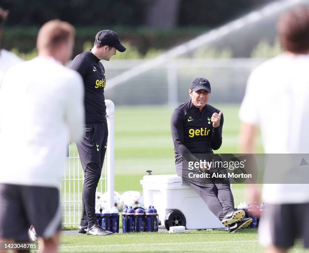 Antonio Conte, head coach of Tottenham Hotspur and Ryan Mason, first team coach at Tottenham Hotspur during the Tottenham Hotspur training session...