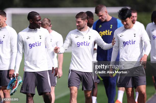 Yves Bissouma, Ben Davies and Heung-Min Son of Tottenham Hotspur during the Tottenham Hotspur training session ahead of their UEFA Champions League...