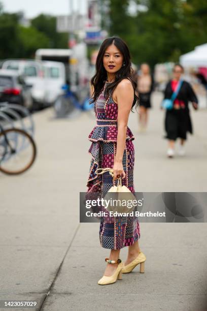 Guest wears a burgundy / pink / blue / beige embroidered pattern tank-top, a matching burgundy / pink / blue / beige embroidered pattern long skirt,...