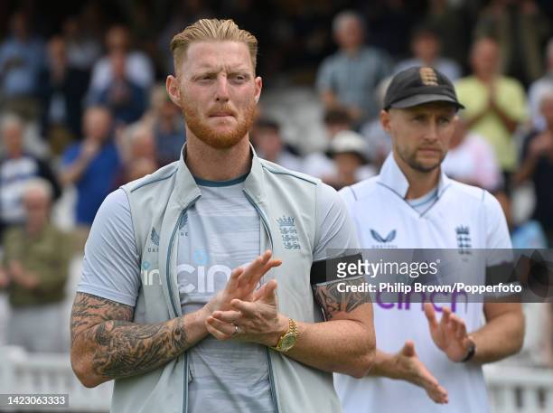 Ben Stokes and Joe Root of England clap after England won the third Test and the series against South Africa at The Kia Oval on September 12, 2022 in...
