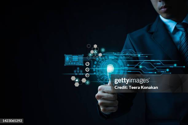 businessman fingerprint scan provides security access with biometrics identification - security code stock pictures, royalty-free photos & images