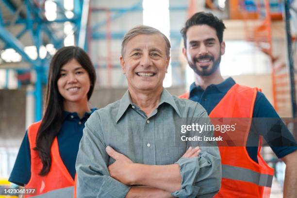 warehouse team - grey polo shirt stock pictures, royalty-free photos & images