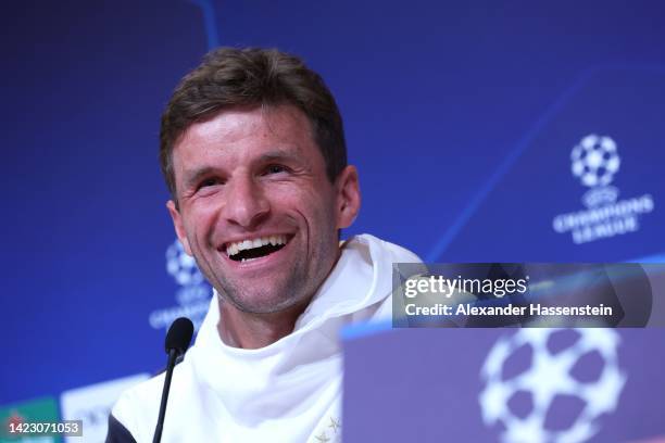 Thomas Müller of FC Bayern München talks to the media during a press conference ahead of their UEFA Champions League group C match against FC...