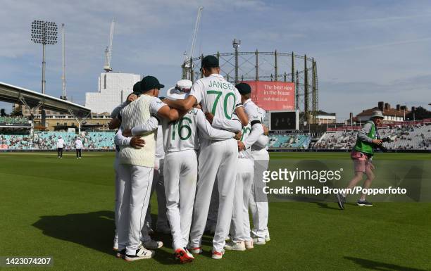 The South Africa team in a huddle as photographer Gareth Copley runs off before the fifth day of the third Test against England at The Kia Oval on...