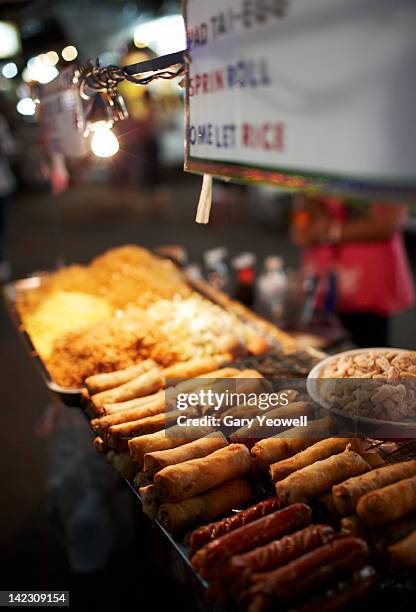 traditional thai street food on market stall - khao san road stock pictures, royalty-free photos & images
