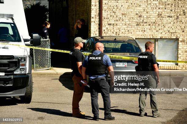 Arvada police officers investigate the scene of a shooting where an officer was killed in the 6700 block of West 51st Avenue on September 11, 2022 in...