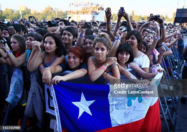 Fans listen to the group MGMT in the Lollapalooza music festival at O Higgins Park on April 1, 2012 in Santiago, Chile.