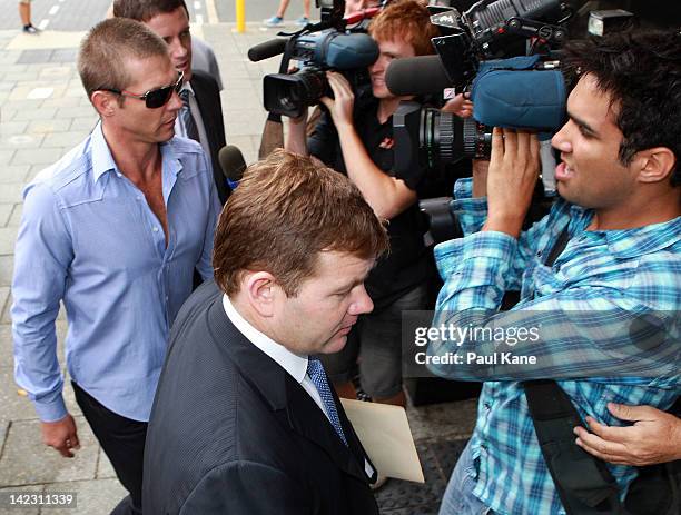 Ben Cousins and his lawyer Michael Tudori arrive at the Perth Magistrates Court on April 2, 2012 in Perth, Australia. Former AFL player, Cousins was...