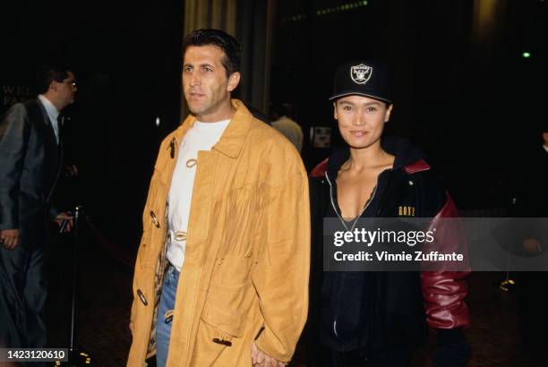 Producer Elie Samaha and Actress Tia Carrere attend the 'White Men Can't Jump' Westwood Premiere held at Avco Center Cinema in Westwood, California,...