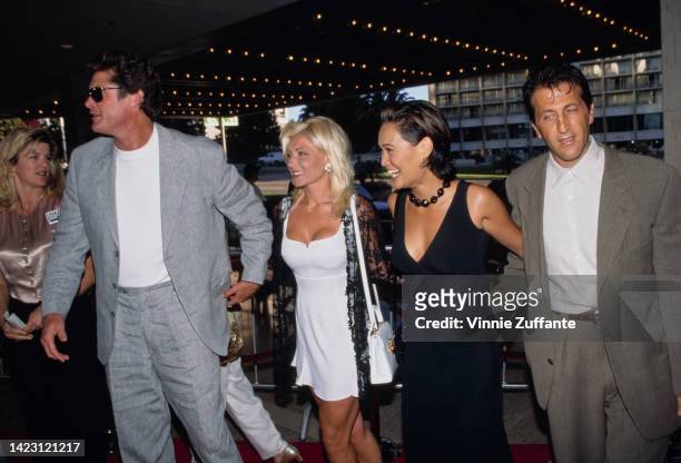 Daivd Hasslehoff, his wife Pamela Bach, Tia Carrere and her husband Elie Samaha, attend 'Nine Months' premiere in Los Angeles, California, United...